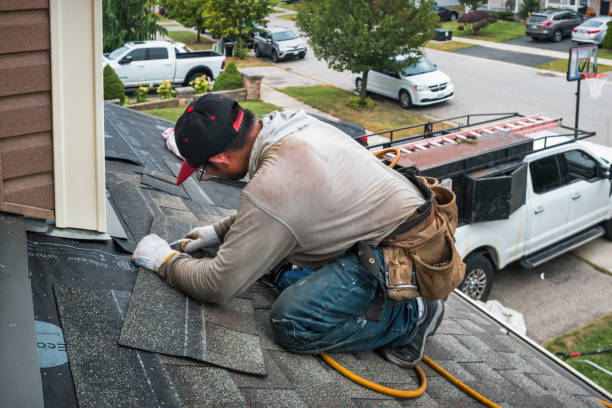 Professional Roofing technician working in Highland Park, NJ